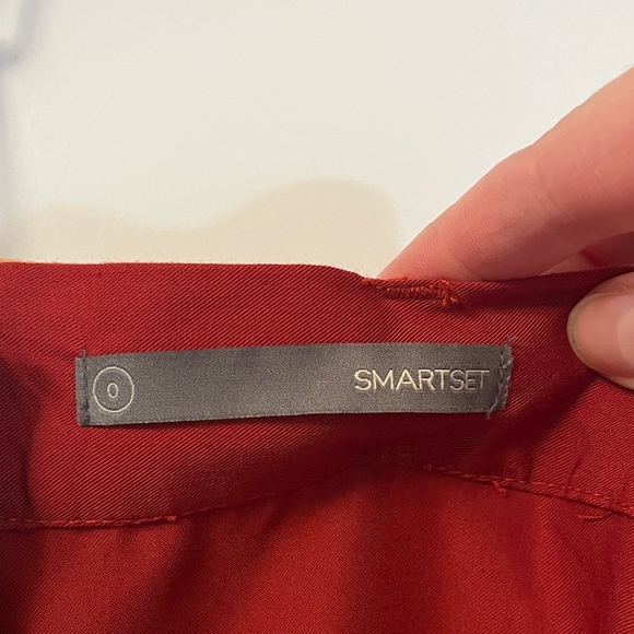 Smart Set A-Line Skirt in a rich rusty red color. 2” waistband for skinny belt - Picture 2 of 6